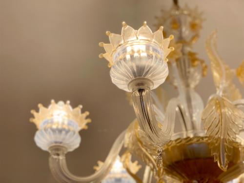 a close up of a glass vase with a mirror at Villa Le Baste in Furore