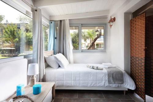 Ένα ή περισσότερα κρεβάτια σε δωμάτιο στο Chania Green House 2