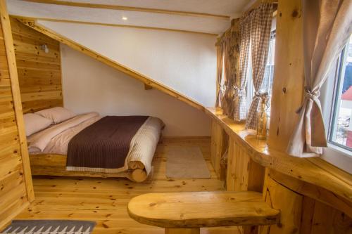 Tempat tidur dalam kamar di Durmitorske zore