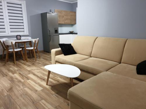 Η κουζίνα ή μικρή κουζίνα στο Caskada Modern Apartments 2 NOWY APARTAMENTOWIEC WINDA