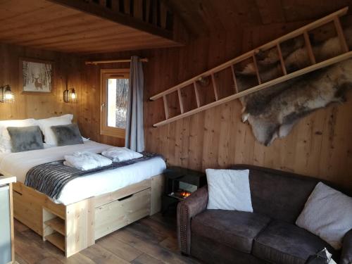 מיטה או מיטות בחדר ב-Ma Cabane des Hautes-Alpes