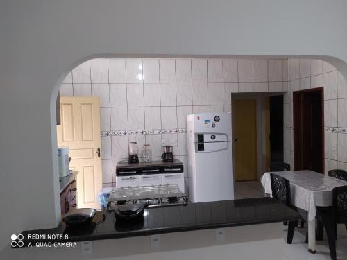 
A cozinha ou cozinha compacta de Hostel Lençóis Park
