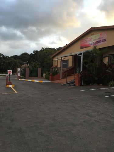 a parking lot in front of a building at Shad in Palm Beach