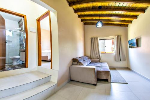 Postel nebo postele na pokoji v ubytování Morada Coqueiral do Rosa I