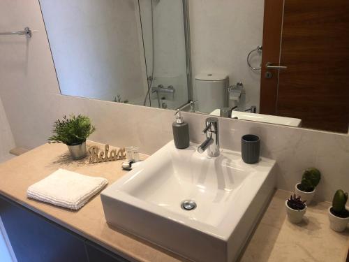 Koupelna v ubytování Luz Beach Luxury Apartment