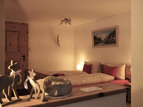 Ένα ή περισσότερα κρεβάτια σε δωμάτιο στο Chesa Sper l'Ovel Brail