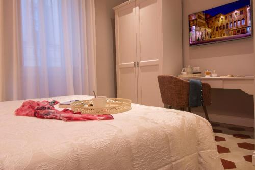 Katil atau katil-katil dalam bilik di B&B PISTOIA INN
