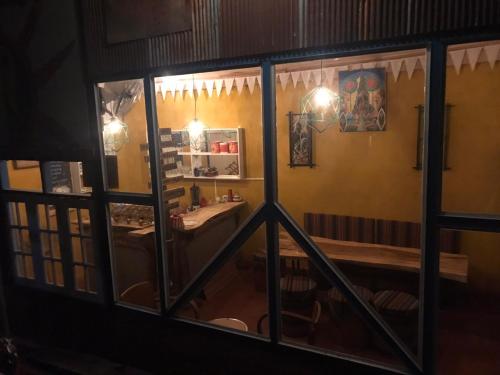 a view of a room through a window at Sook Jai Guest House in Chiang Rai