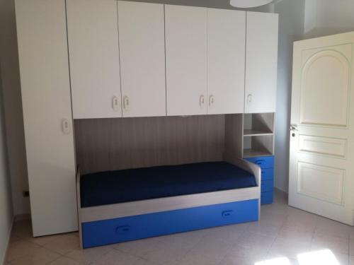 מיטה או מיטות בחדר ב-Posto letto in stanze singole al centro di Enna