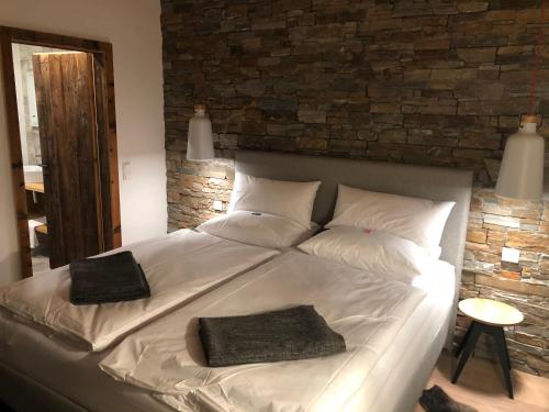 Postel nebo postele na pokoji v ubytování Seeapartment am Hallstätter See