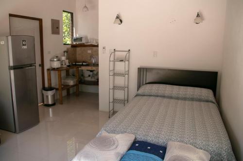 Katil atau katil-katil dalam bilik di Villas Cabuya Beach & Jungle