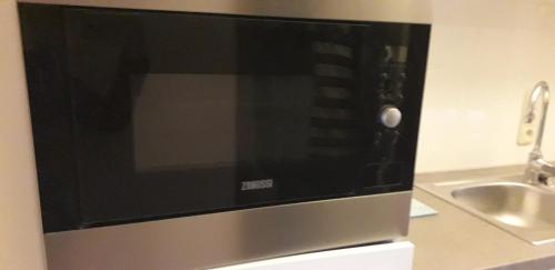 Kuchyň nebo kuchyňský kout v ubytování Appartement à Bredene au rez-de-chaussée