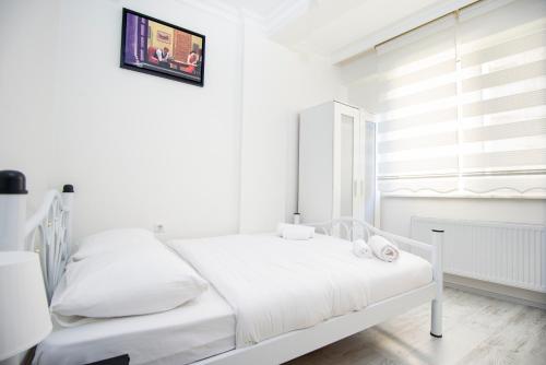 Katil atau katil-katil dalam bilik di Arney Suites