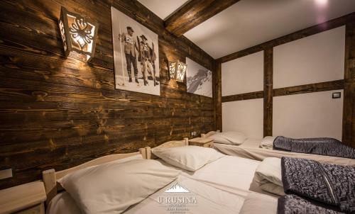 Postel nebo postele na pokoji v ubytování Apartamenty u Rusina