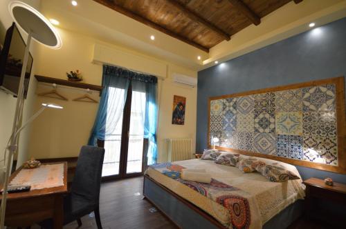 Letto o letti in una camera di Centro Sicilia Rooms-Suites & Terrace
