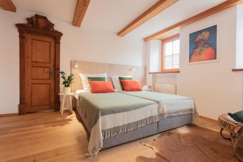 Ένα ή περισσότερα κρεβάτια σε δωμάτιο στο Ledererhaus