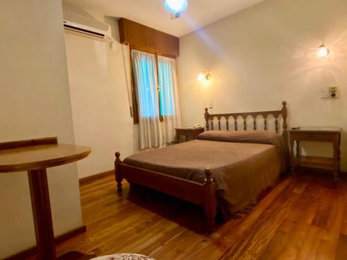 Letto o letti in una camera di Hotel Villa Inés Mendoza