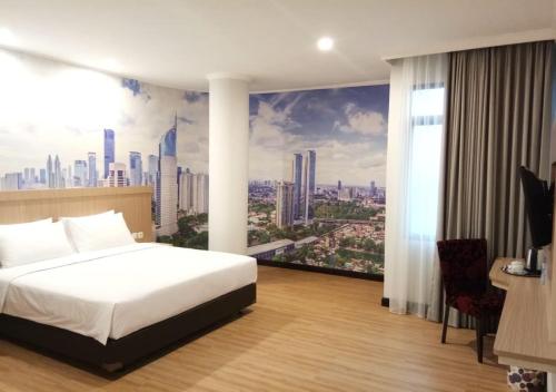 Postel nebo postele na pokoji v ubytování GiiA Sanno Hotel Pluit