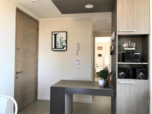 Concón Costa de Montemar Departamento, 3 dormitoriosにあるキッチンまたは簡易キッチン