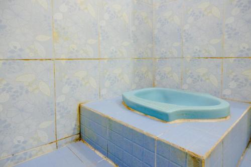 Ванная комната в OYO 2417 Melati Residence