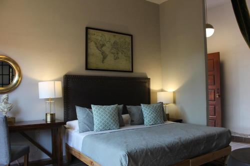 Ένα ή περισσότερα κρεβάτια σε δωμάτιο στο Hotel Real de Piedra