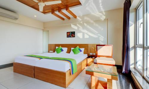 Cama o camas de una habitación en Treebo Park - 500m from Medical College
