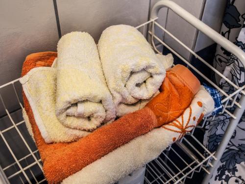 a bunch of towels are sitting on a rack at Silba Otium in Silba