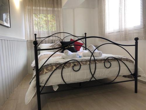 Postel nebo postele na pokoji v ubytování Katsikantaris Homes