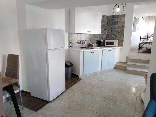 Kuchyň nebo kuchyňský kout v ubytování Katsikantaris Homes