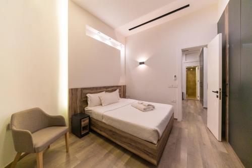 Postel nebo postele na pokoji v ubytování Loft 29 Residence