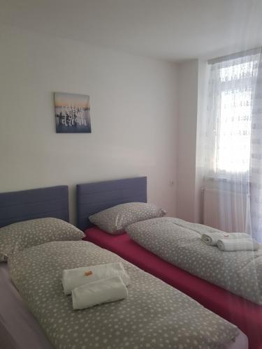 Postel nebo postele na pokoji v ubytování Apartman Taša