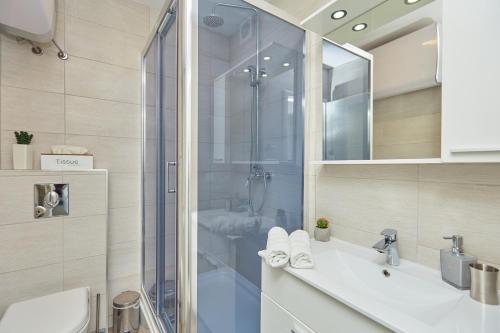 Ένα μπάνιο στο Apartments Muminovic