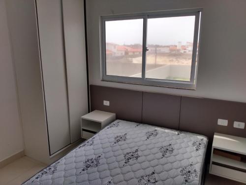 Кровать или кровати в номере Aquaville Atalaia Apartamentos