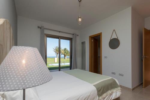 Villas Caleta Beach & Golfにあるベッド