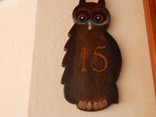 a clock with the number on a wall at Residence La Pineta in Padola