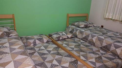 Cama o camas de una habitación en Charlotta apartamento 201 - Apartamento na Praia de 4 Ilhas