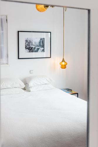 Ένα ή περισσότερα κρεβάτια σε δωμάτιο στο Comercial Boutique Guest House