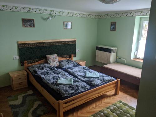 Posteľ alebo postele v izbe v ubytovaní Római Fürdő Apartmanház
