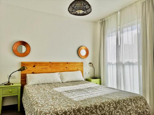 Posteľ alebo postele v izbe v ubytovaní The Blue Corner Apartments