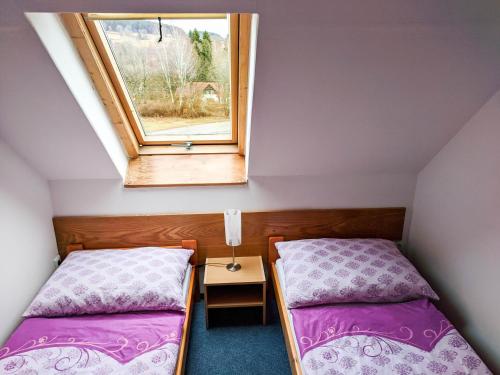 Postel nebo postele na pokoji v ubytování Pohoda u Lva