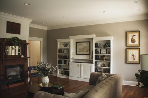 a living room with a couch and a fireplace at The Respite - Bed and Breakfast in Paducah