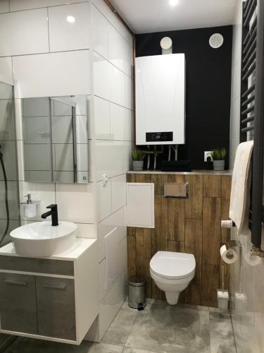 Kúpeľňa v ubytovaní Apartament Przy Promenadzie