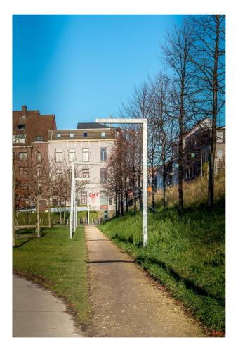 an empty street with a soccer goal in front of a building at Central Perk Apartments-Antwerp in Antwerp