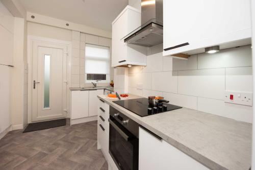 PREMIER - Dalziel Apartment tesisinde mutfak veya mini mutfak