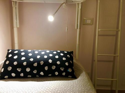 Ein Bett oder Betten in einem Zimmer der Unterkunft L'arciere