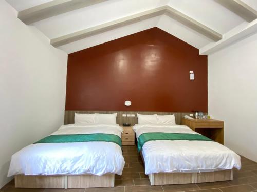 Una cama o camas en una habitación de Lorna Resort