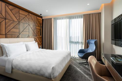 Ένα ή περισσότερα κρεβάτια σε δωμάτιο στο Radisson Blu Hotel, Sakarya