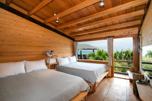 Postel nebo postele na pokoji v ubytování Bixilian B&B