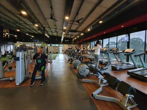a group of people working out in a gym at ARENA Boutique Hotel Kuala Terengganu in Kuala Terengganu