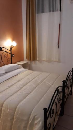 Krevet ili kreveti u jedinici u okviru objekta Il Rifugio dell'Ape Agriturismo